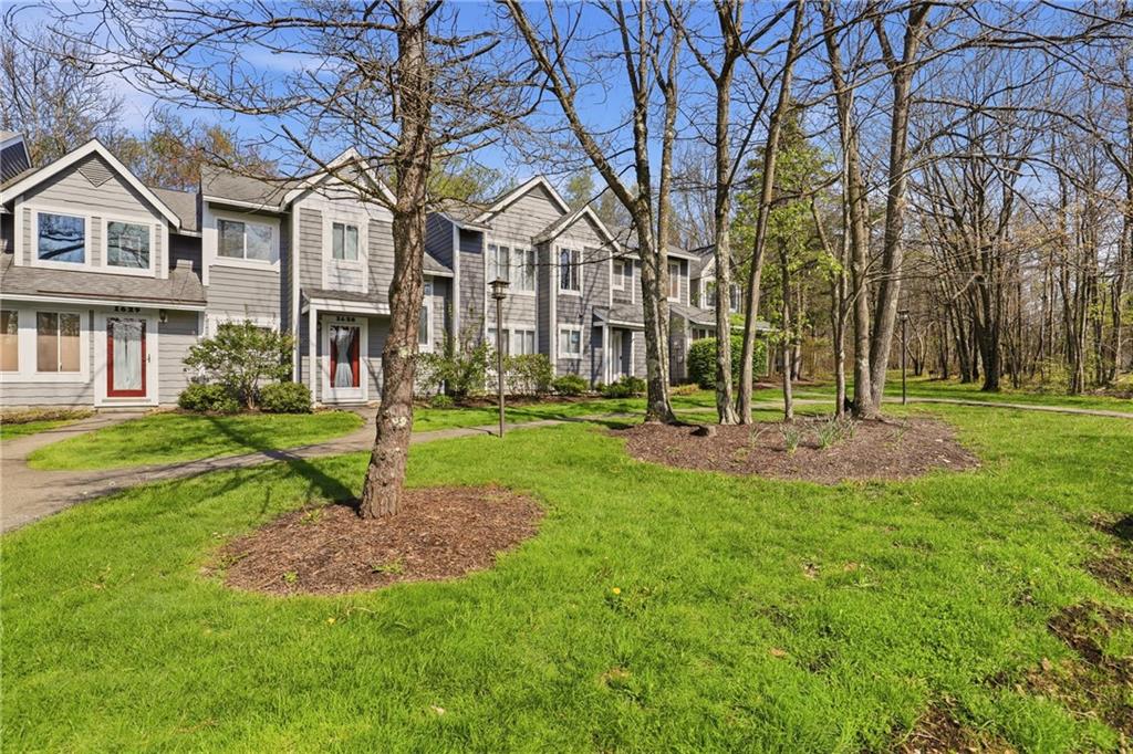1627 Snowfield Way Hidden Valley, PA 15502 - Photo 3 of 38 a view of a green field with trees