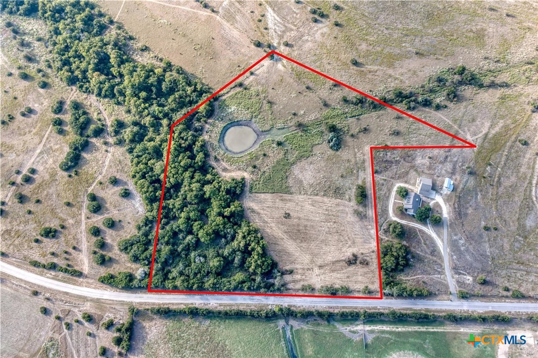 Lot 3 Hackberry Ranchettes Hackberry Road Salado, TX 76571 - Photo 4 of 13 a view of a wooden bridge