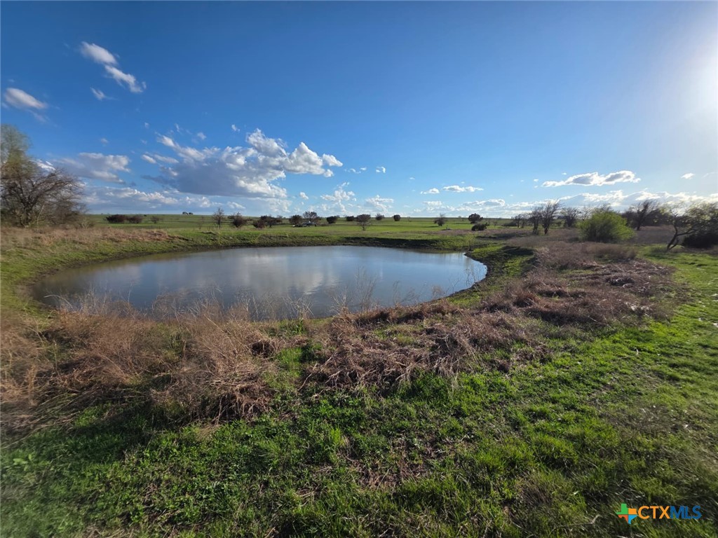 Lot 3 Hackberry Ranchettes Hackberry Road Salado, TX 76571 - Photo 9 of 13 a view of a lake with outside a house