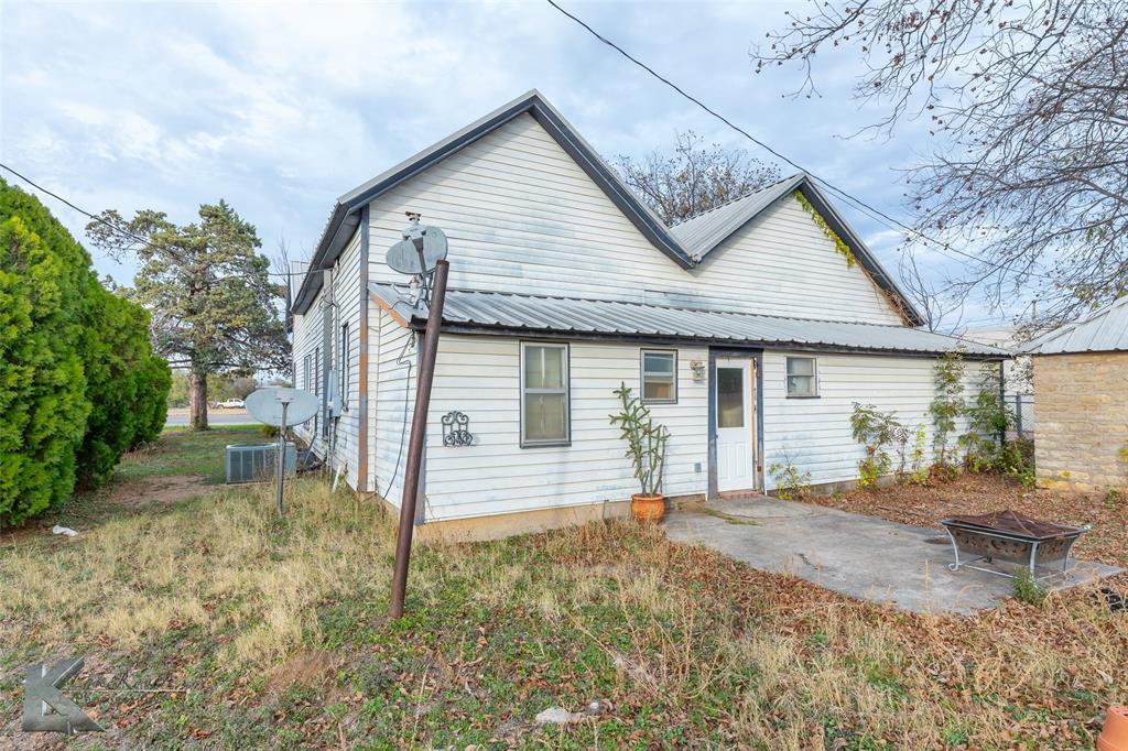 141 East 3rd Street Baird, TX 79504 - Photo 33 of 33 a view of a house with backyard and chairs