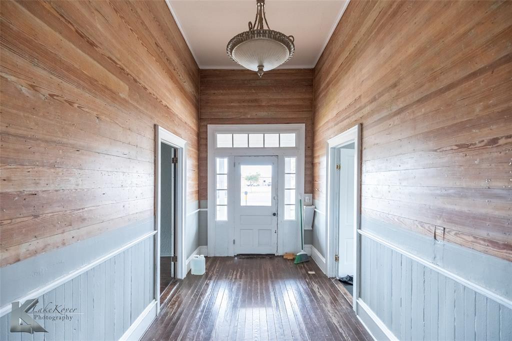141 East 3rd Street Baird, TX 79504 - Photo 5 of 33 a view of entryway with wooden floor