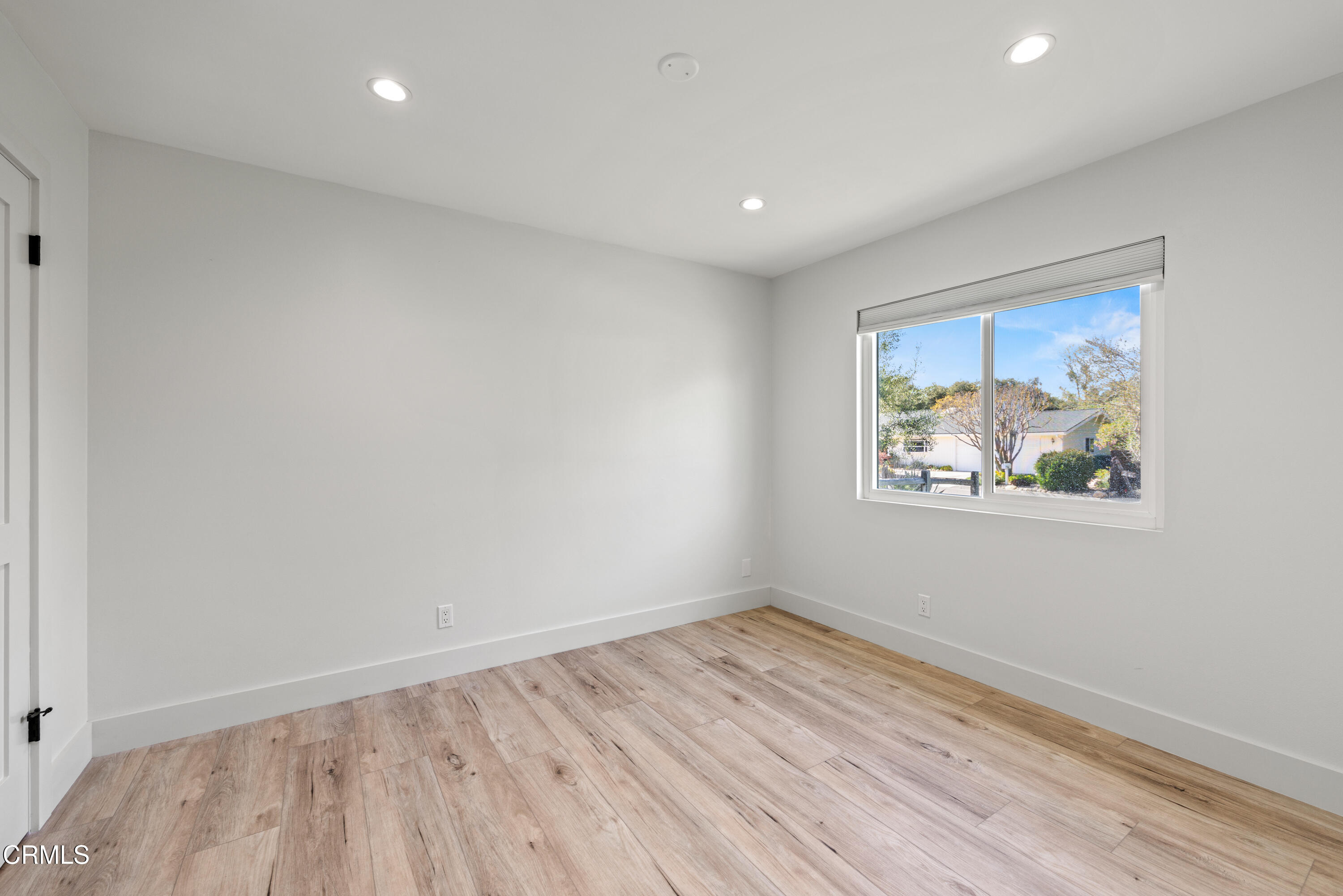 246 3rd Street Solvang, CA 93463 - Photo 14 of 33 a view of room with wooden floor and window