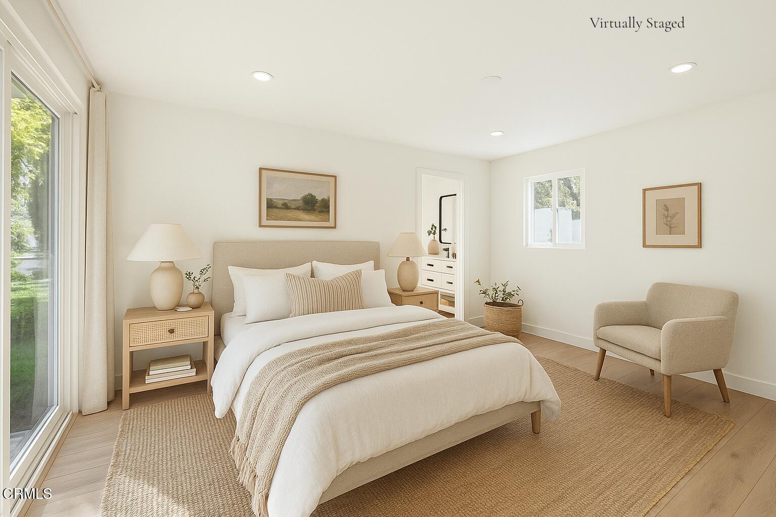 246 3rd Street Solvang, CA 93463 - Photo 19 of 33 a bedroom with a bed and a chair