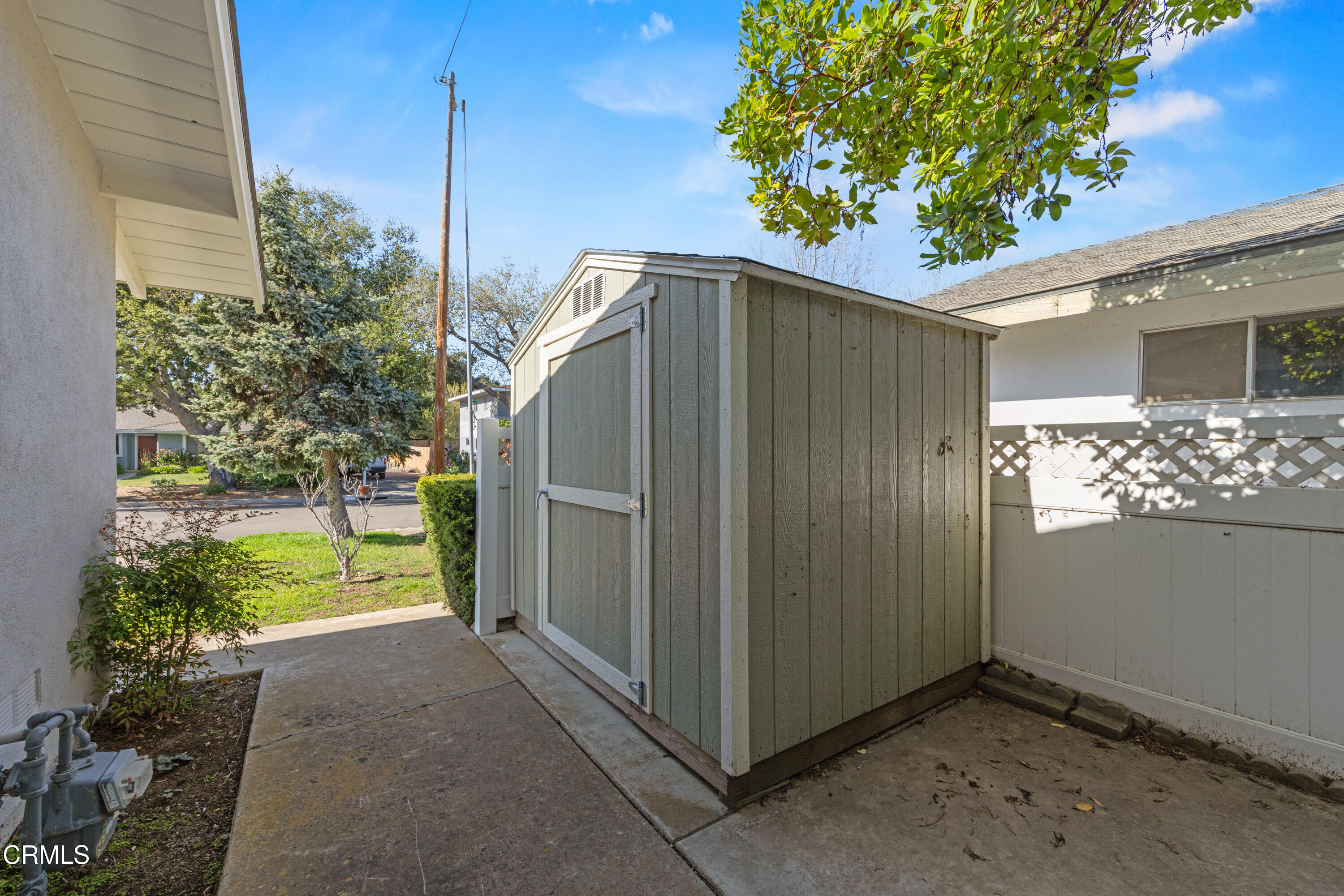 246 3rd Street Solvang, CA 93463 - Photo 30 of 33 a house with trees in front of it