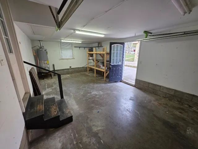 a view of a hallway with stairs