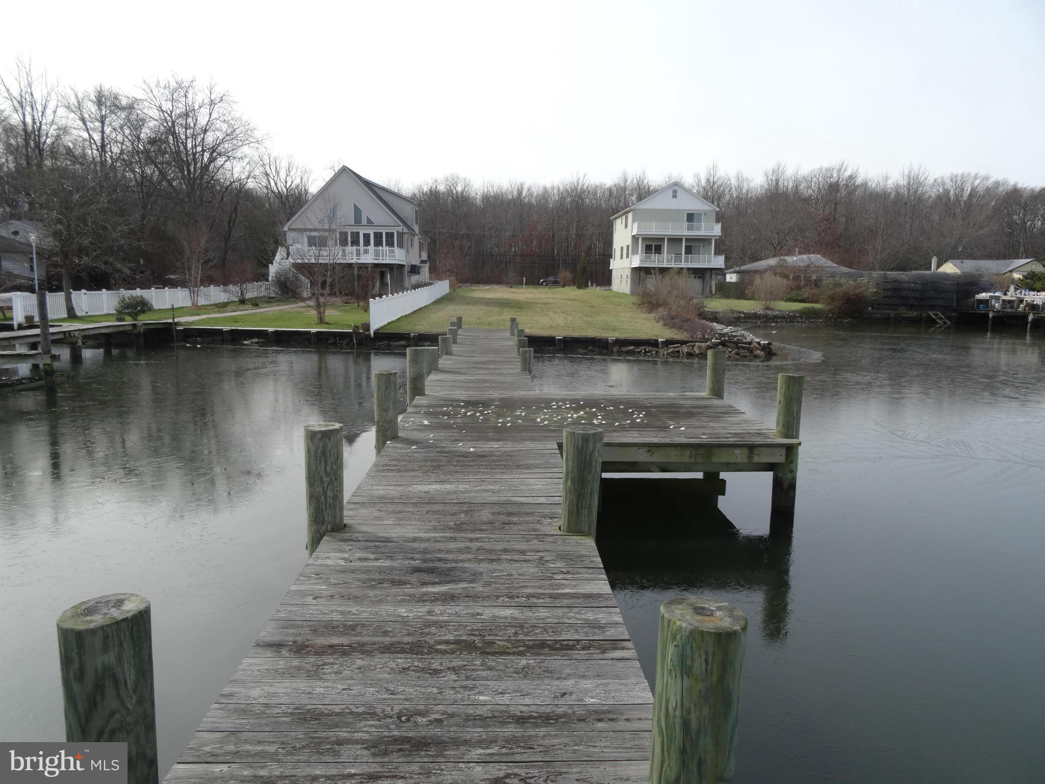 923 Bowleys Quarters Road Middle River, MD 21220 - Photo 1 of 16 a front view of a house with a lake view