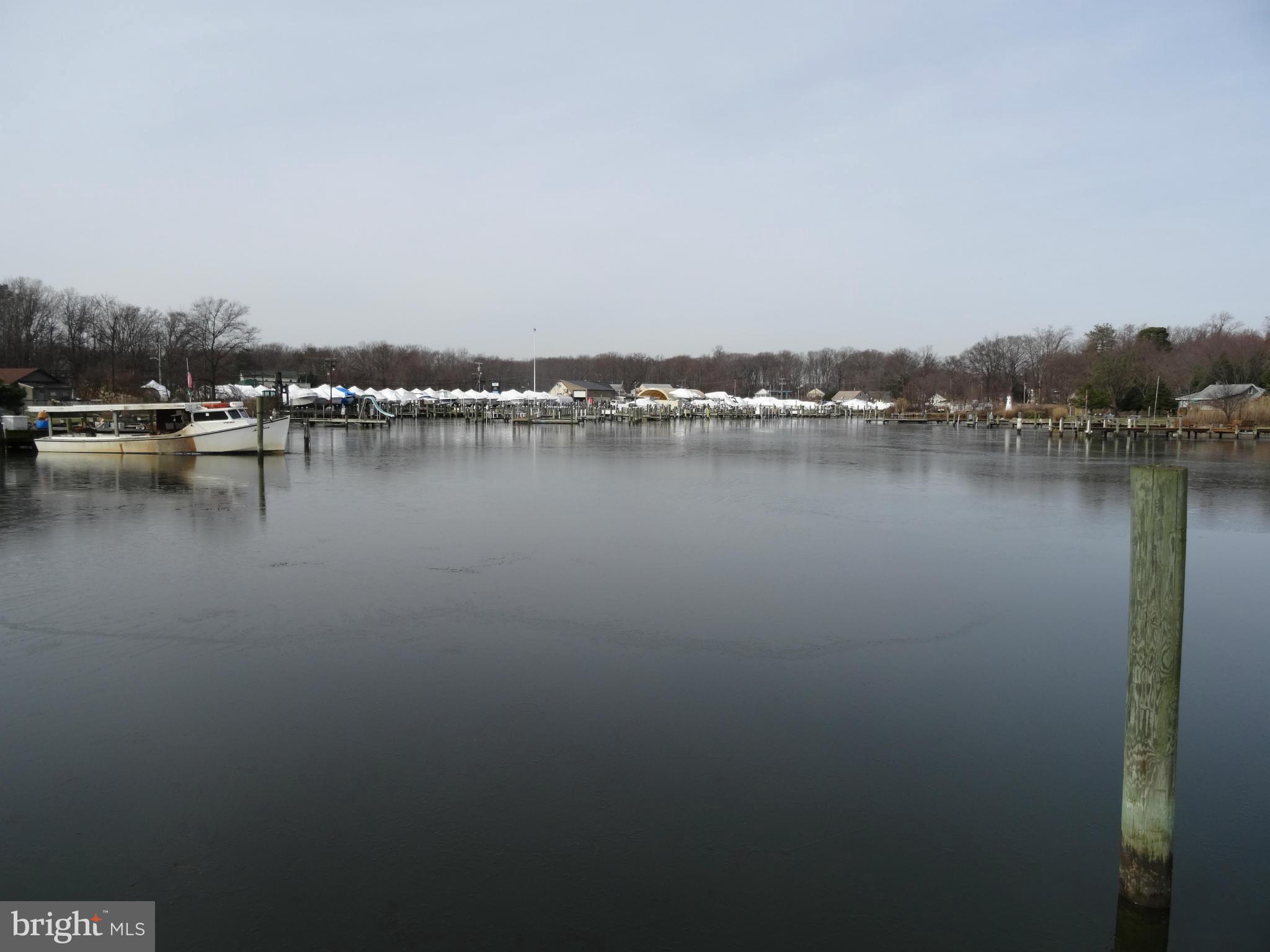 923 Bowleys Quarters Road Middle River, MD 21220 - Photo 3 of 16 an aerial view of ocean with residential houses with outdoor space and seating