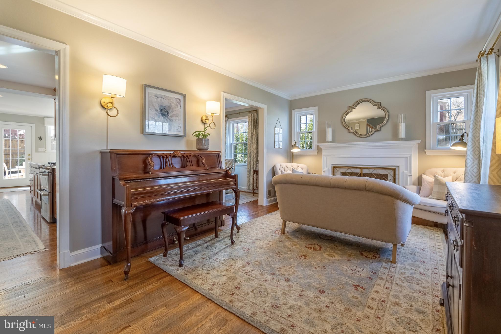 1910 Everest Street Silver Spring, MD 20902 - Photo 3 of 21 Light-filled living room with hardwood flooring