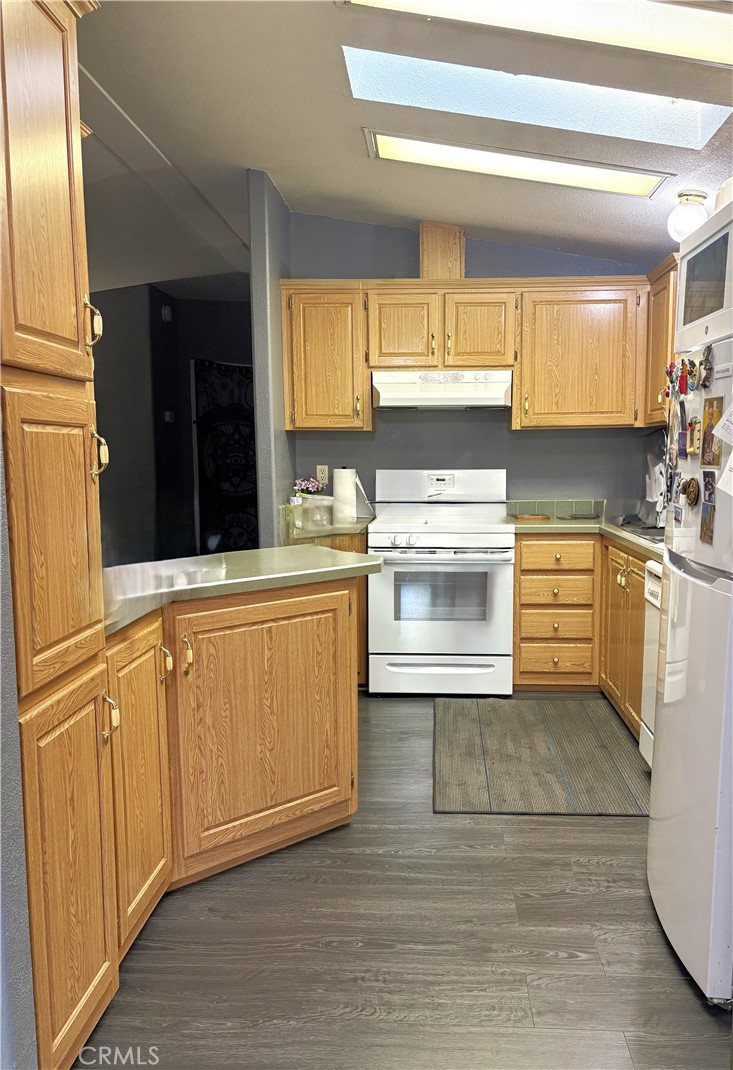 10745 Victoria Avenue, Unit 4 Whittier, CA 90604 - Photo 7 of 16 a kitchen with stainless steel appliances granite countertop a stove and a sink