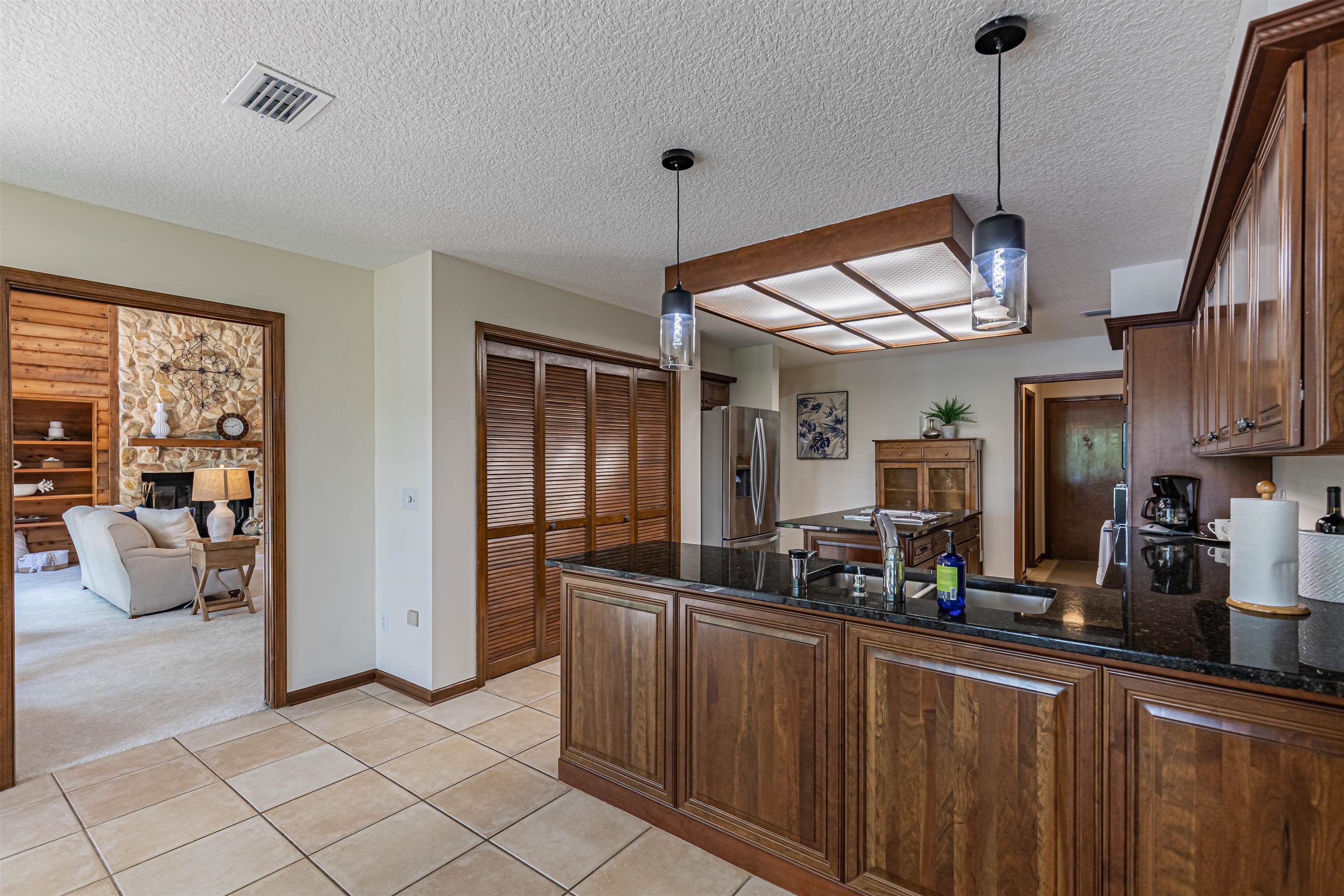 2321 Halperns Way Middleburg, FL 32068 - Photo 22 of 63 a kitchen with stainless steel appliances granite countertop a refrigerator and a sink