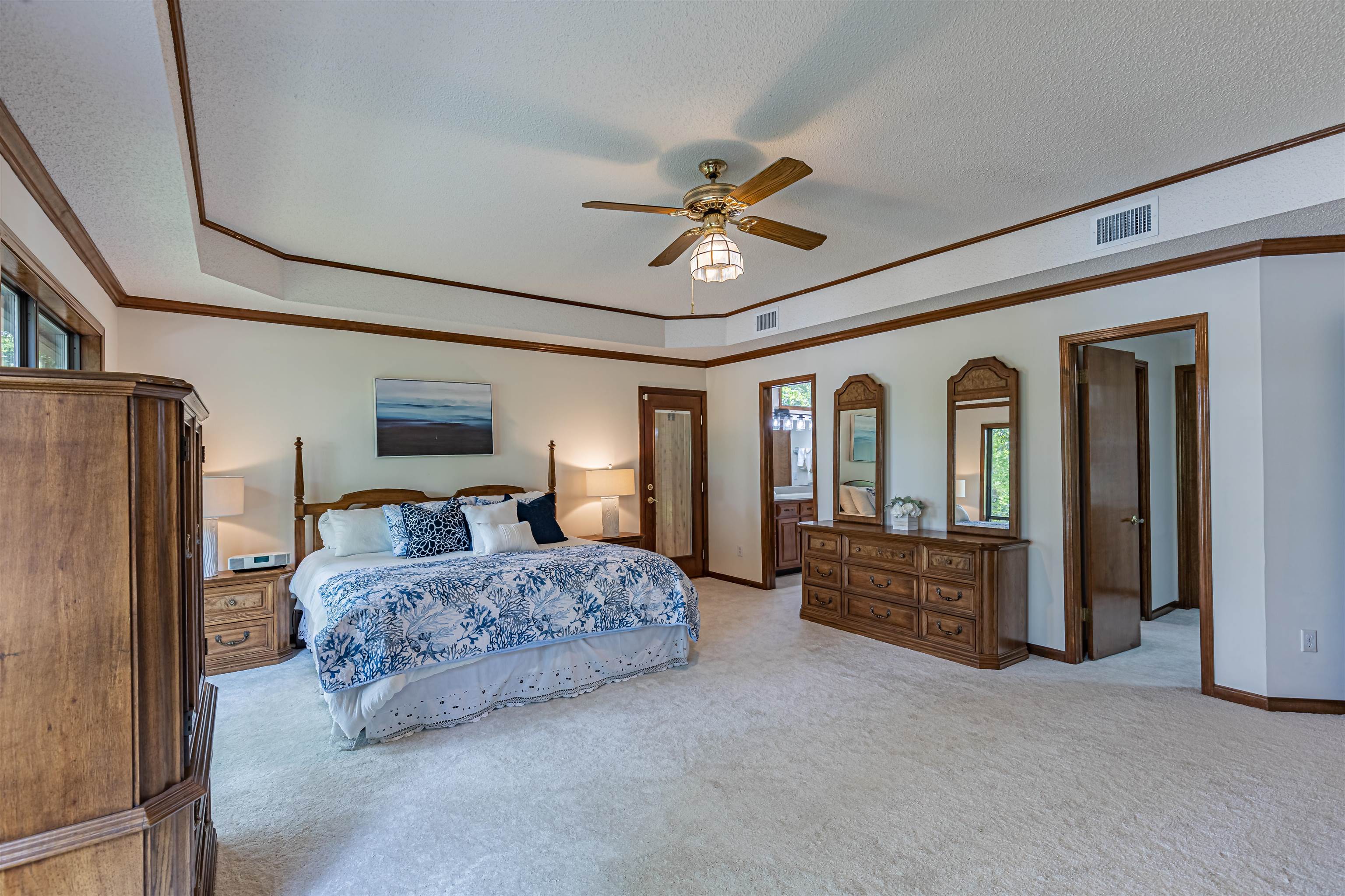 2321 Halperns Way Middleburg, FL 32068 - Photo 34 of 63 a bedroom with a large bed and ceiling fan
