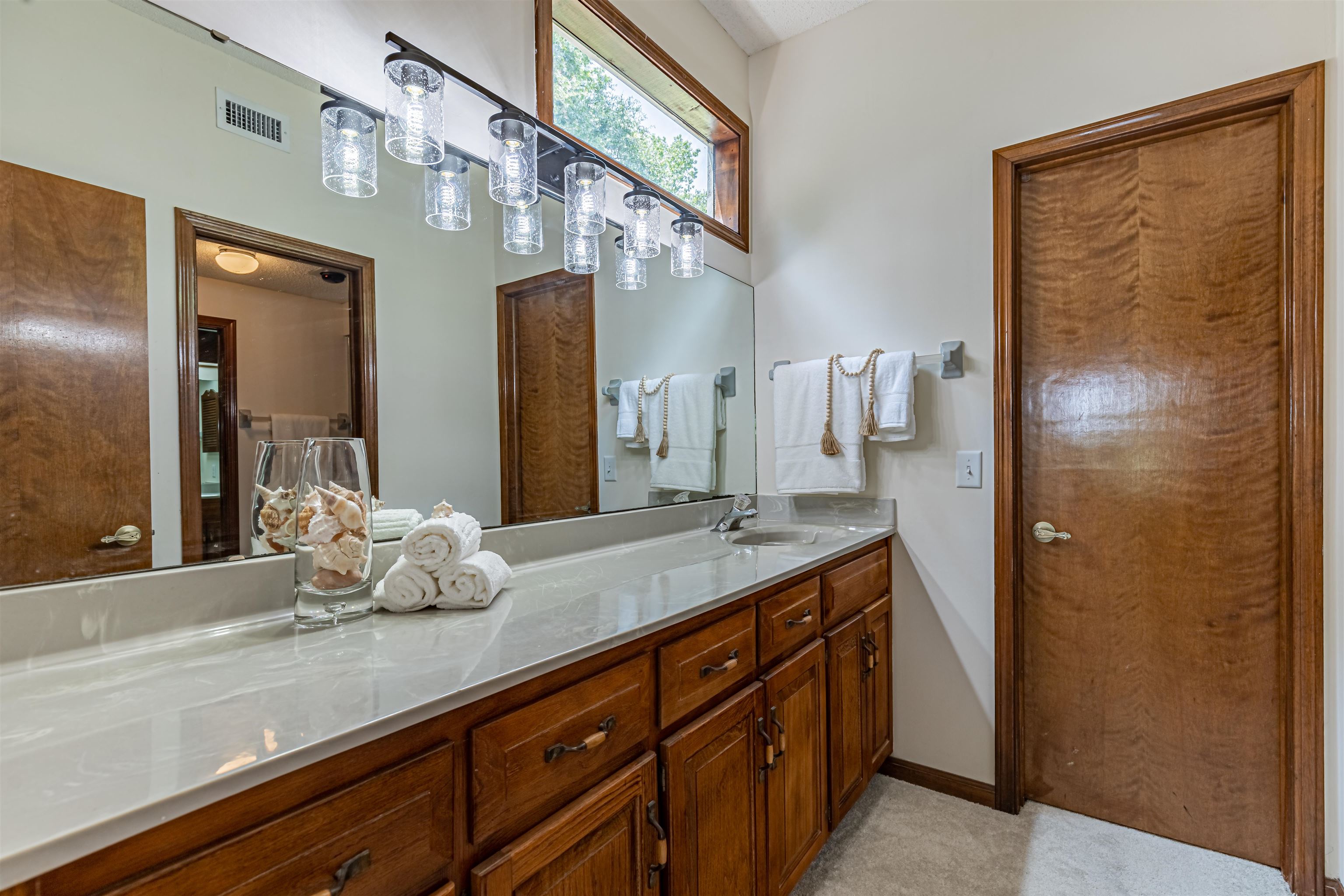 2321 Halperns Way Middleburg, FL 32068 - Photo 47 of 63 a bathroom with a granite countertop sink and a mirror
