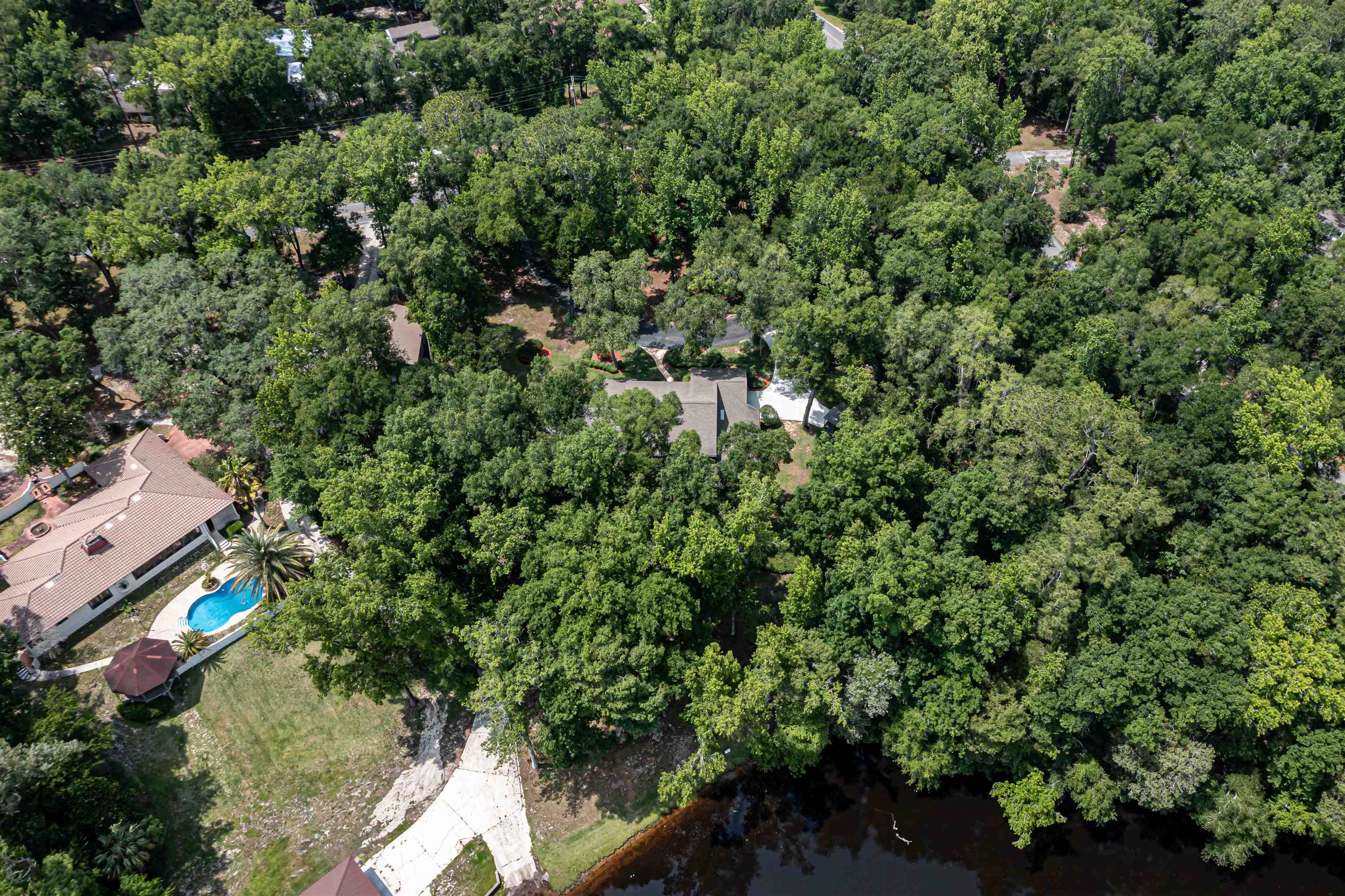 2321 Halperns Way Middleburg, FL 32068 - Photo 61 of 63 an aerial view of residential house with outdoor space and trees all around