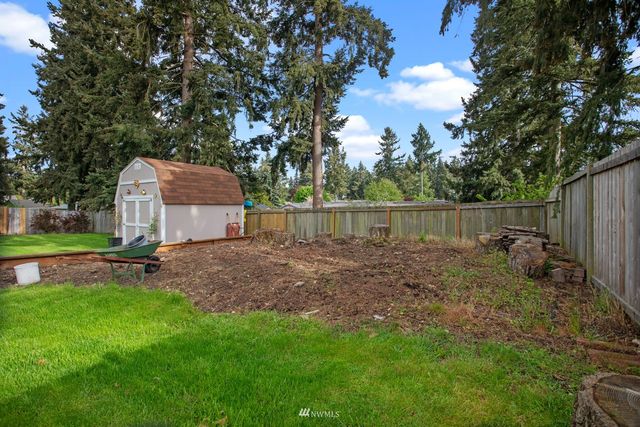 a garden view with a seating space