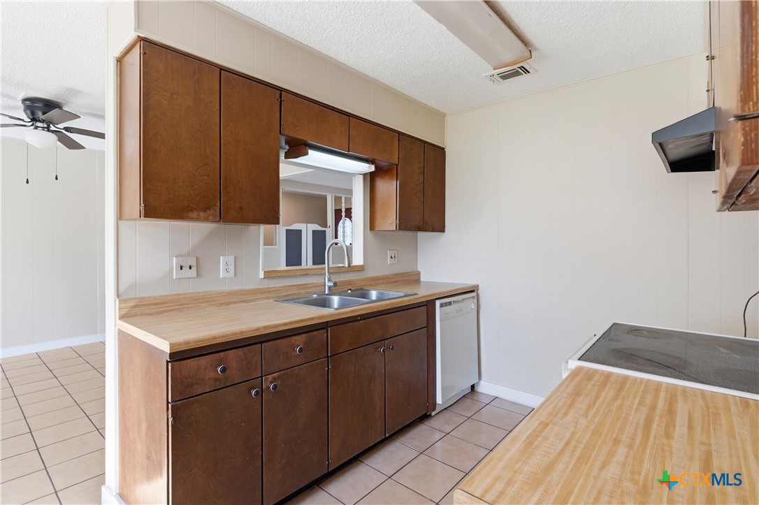 102 Runnel Street Seguin, TX 78155 - Photo 12 of 34 a bathroom with a sink and a mirror