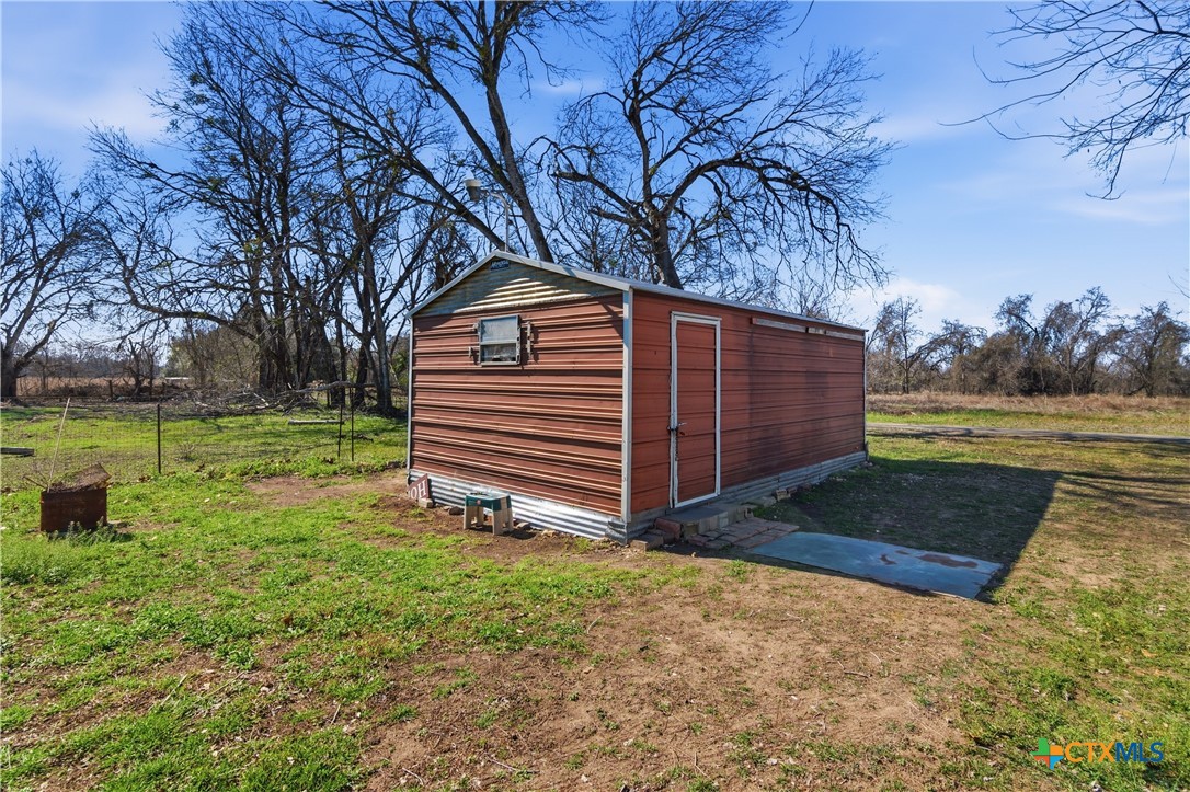 102 Runnel Street Seguin, TX 78155 - Photo 34 of 34 a view of a backyard with large trees