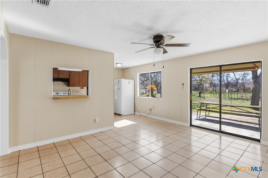 102 Runnel Street Seguin, TX 78155 - Photo 9 of 34 a view of an empty room with a window