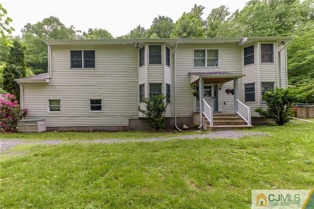 88 Emmans Road Ledgewood, NJ 07852 - Photo 1 of 25 a view of a house with backyard and garden