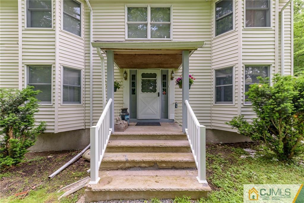 88 Emmans Road Ledgewood, NJ 07852 - Photo 2 of 25 a front view of a house with a porch