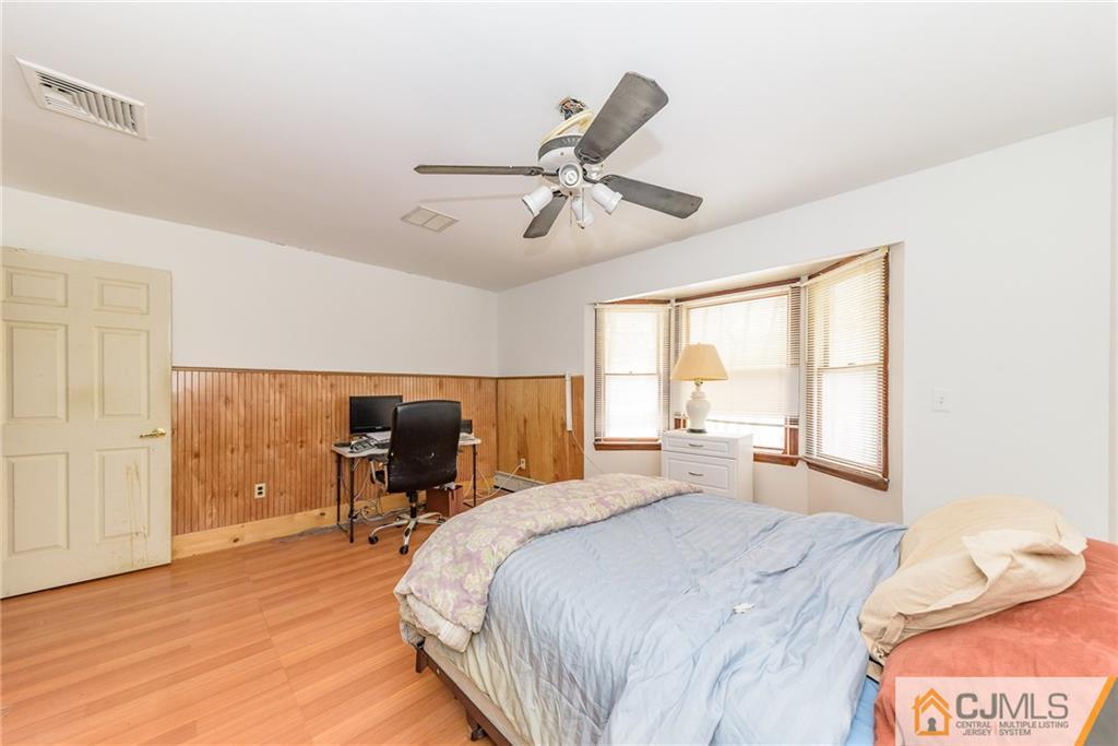 88 Emmans Road Ledgewood, NJ 07852 - Photo 14 of 25 a bedroom with a bed and wooden floor