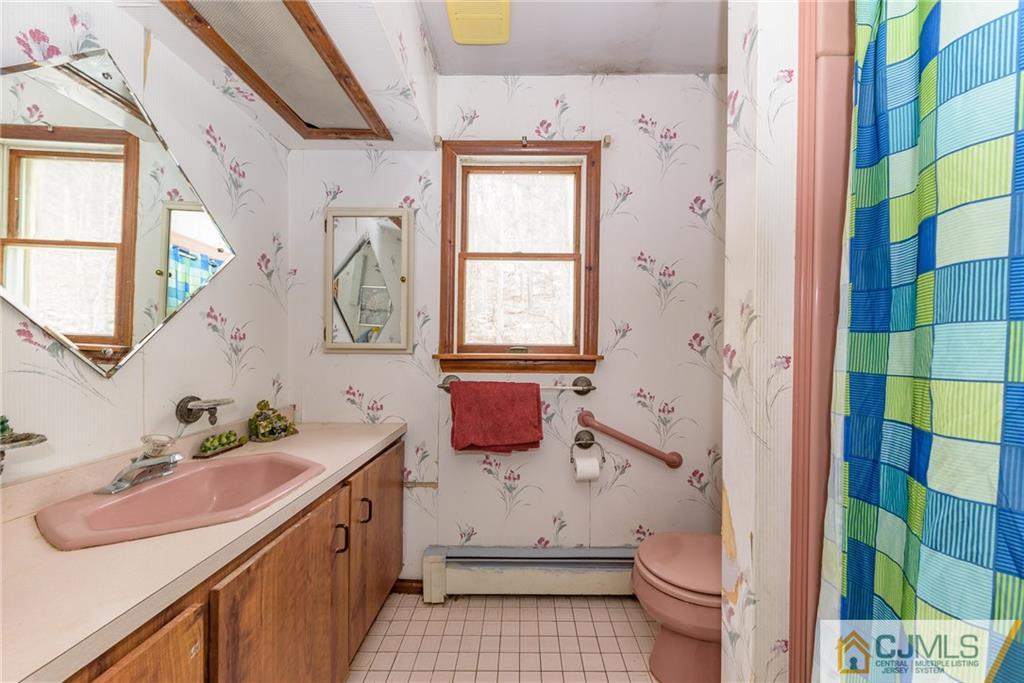 88 Emmans Road Ledgewood, NJ 07852 - Photo 15 of 25 a bathroom with a sink toilet and shower
