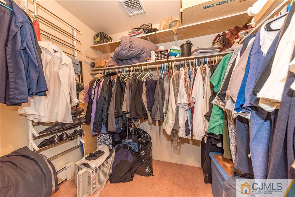 88 Emmans Road Ledgewood, NJ 07852 - Photo 18 of 25 a view of walk in closet with clothes
