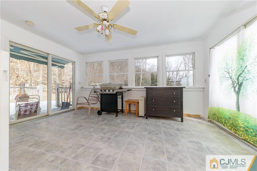88 Emmans Road Ledgewood, NJ 07852 - Photo 19 of 25 a room with furniture and a large window
