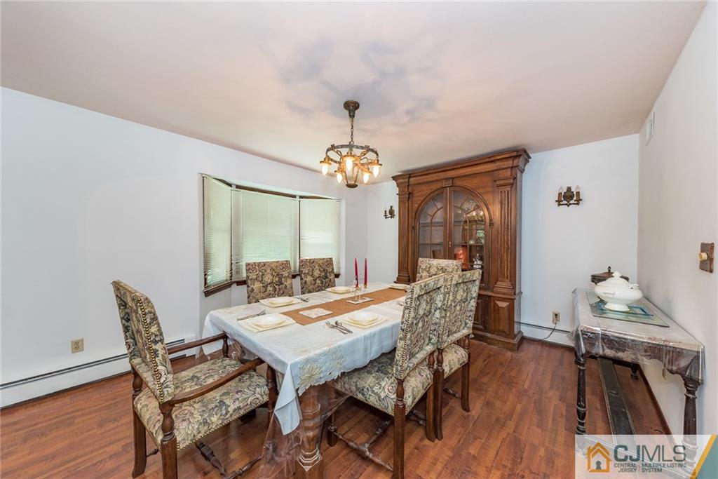 88 Emmans Road Ledgewood, NJ 07852 - Photo 4 of 25 a view of a dining room with furniture window and wooden floor