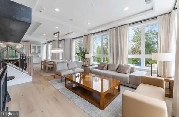 a kitchen that has a lot of cabinets in it