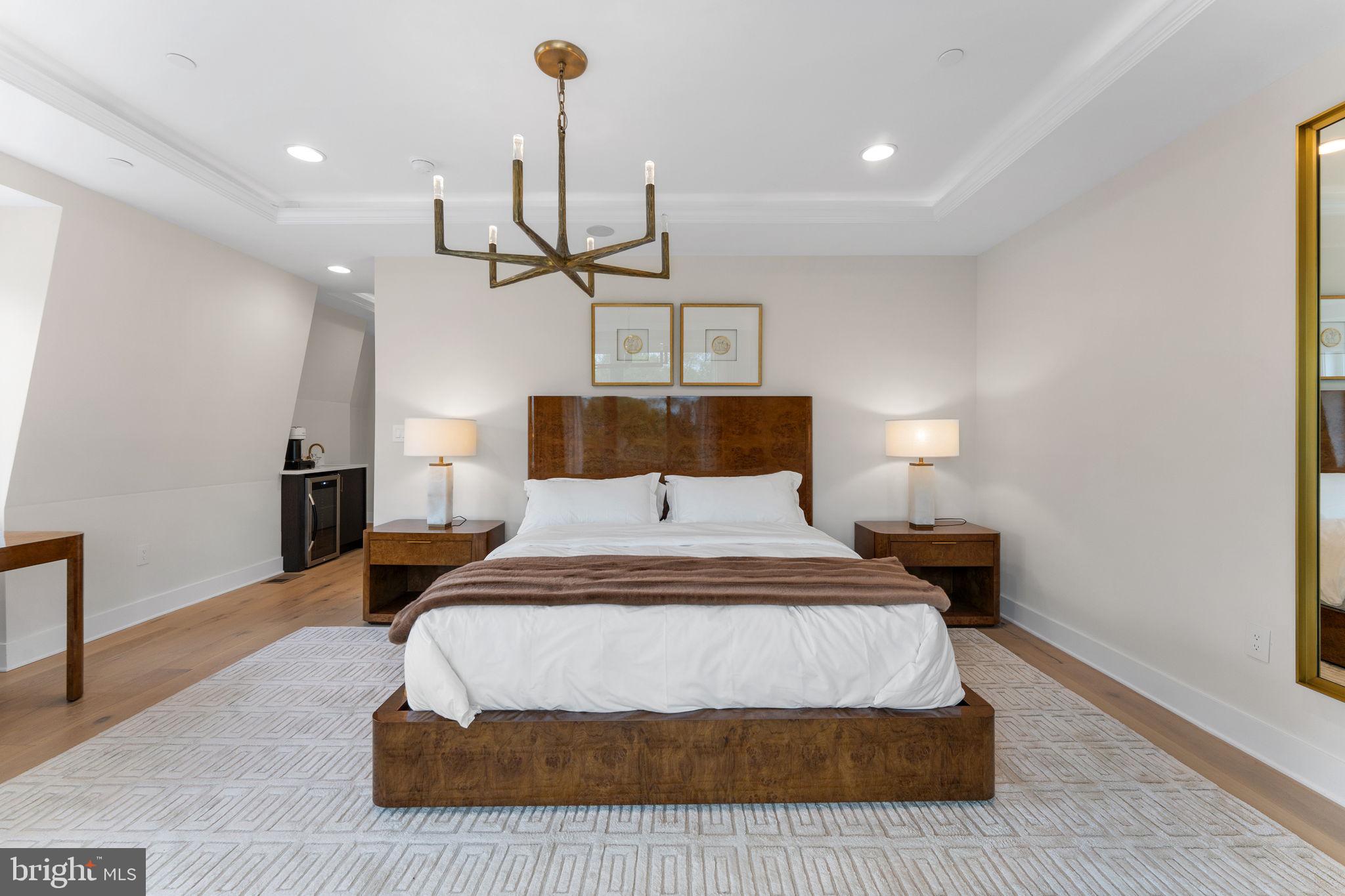 1620 Chain Bridge Road McLean, VA 22101 - Photo 20 of 68 a bedroom with a bed and ceiling fan