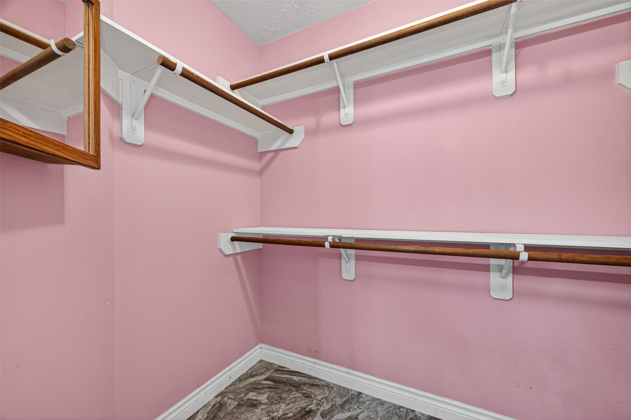 23914 Glengate Drive Spring, TX 77373 - Photo 21 of 49 a view of a room with racks on the wall