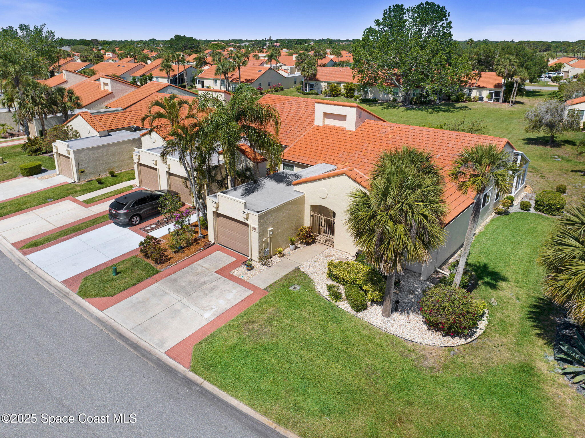 730 Spring Valley Drive Melbourne, FL 32940 - Photo 3 of 39 an aerial view of residential houses with outdoor space and swimming pool