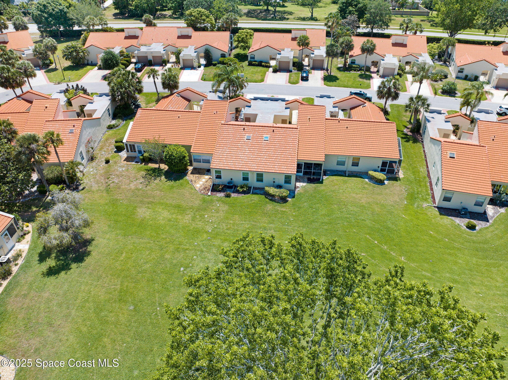 730 Spring Valley Drive Melbourne, FL 32940 - Photo 39 of 39 an aerial view of a house with garden space and street view