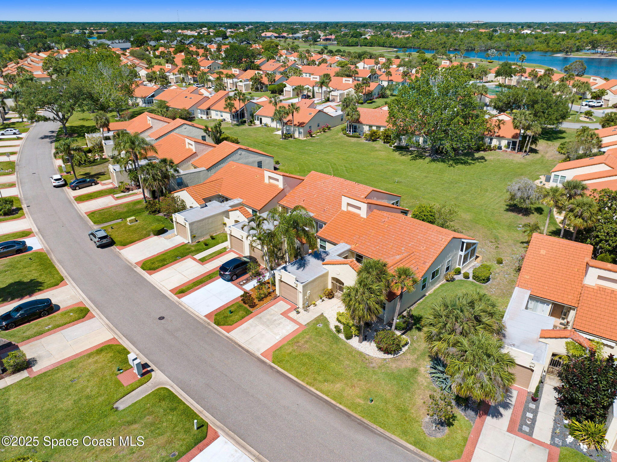 730 Spring Valley Drive Melbourne, FL 32940 - Photo 4 of 39 an aerial view of a house with a garden