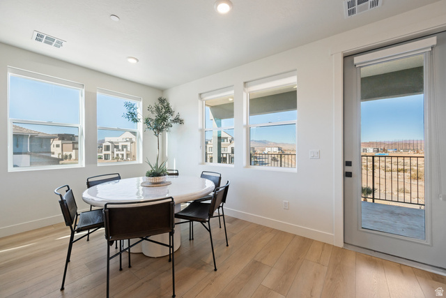 762 West Periwinkle Lane, Unit 102 St. George, UT 84790 - Photo 7 of 40 Dining room with light wood-style floors and recessed lighting