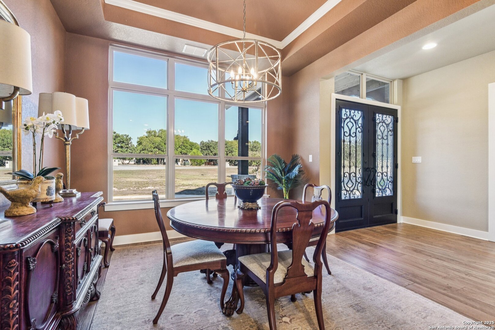 449 Hanging Oak Spring Branch, TX 78070 - Photo 13 of 49 a view of a dining room with furniture window and wooden floor