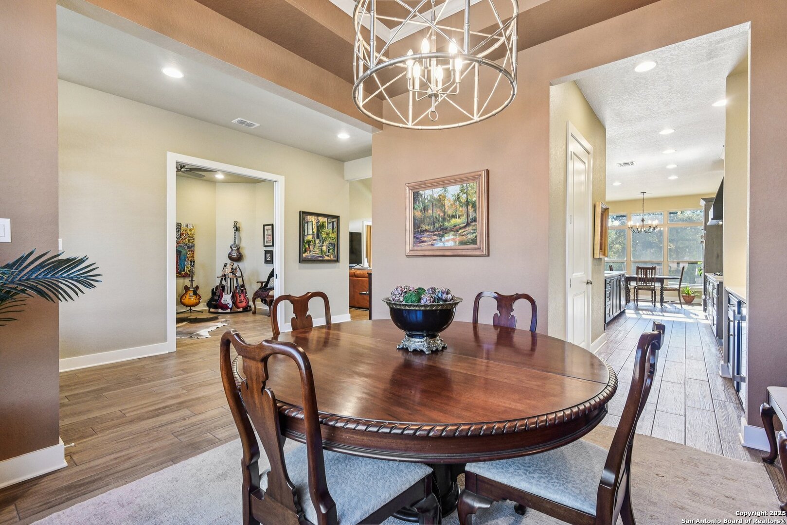 449 Hanging Oak Spring Branch, TX 78070 - Photo 14 of 49 a dining room with furniture a chandelier and wooden floor