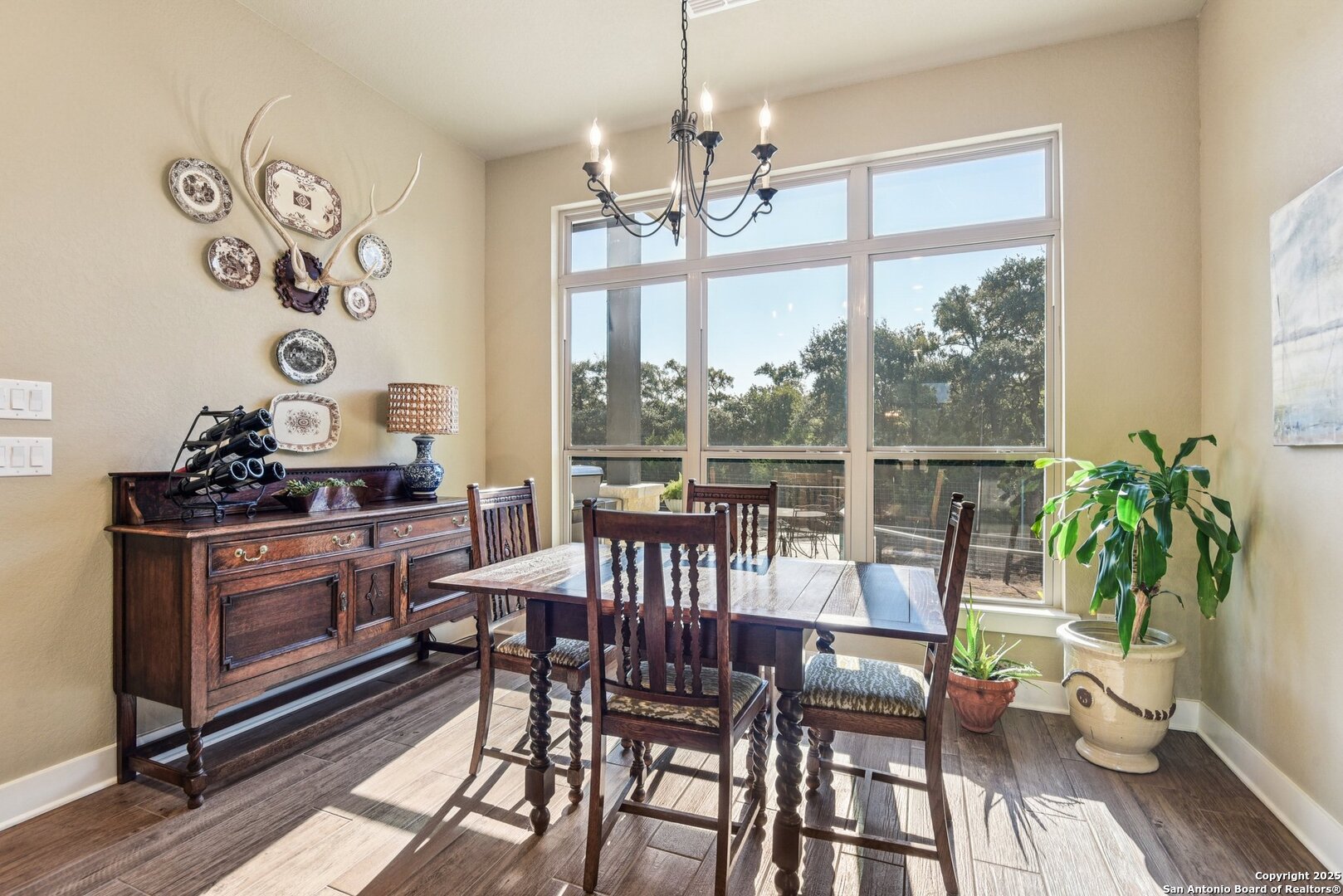 449 Hanging Oak Spring Branch, TX 78070 - Photo 21 of 49 a view of a dining room with furniture window and wooden floor