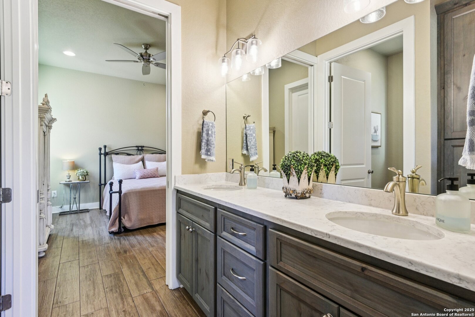449 Hanging Oak Spring Branch, TX 78070 - Photo 24 of 49 a bathroom with a sink double vanity and a mirror