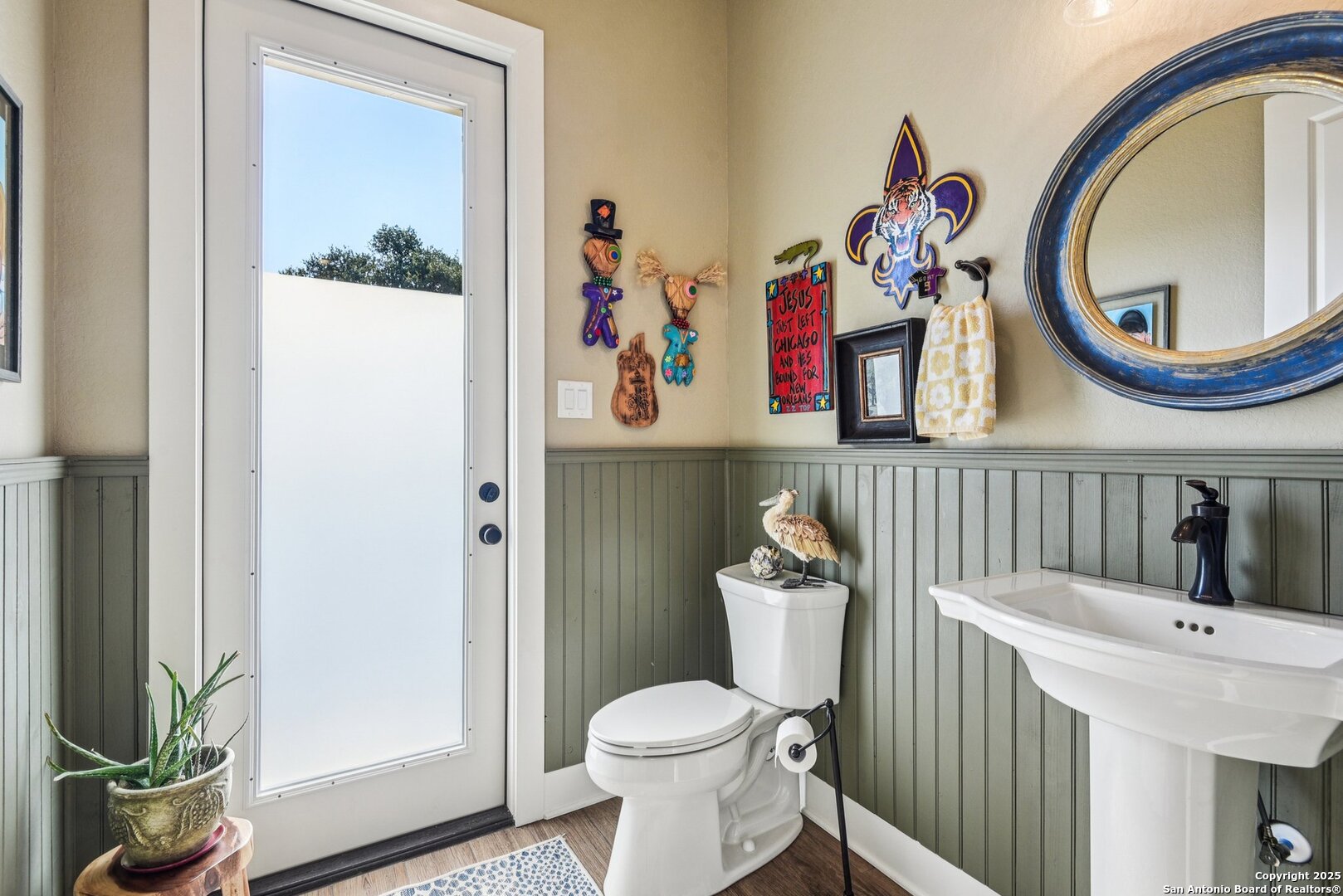 449 Hanging Oak Spring Branch, TX 78070 - Photo 32 of 49 a bathroom with a toilet a sink and a mirror