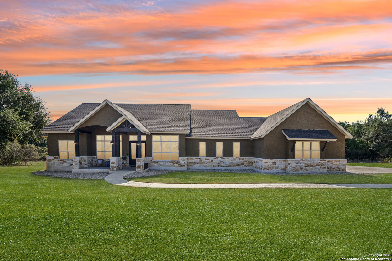 449 Hanging Oak Spring Branch, TX 78070 - Photo 4 of 49 a front view of house with yard and green space