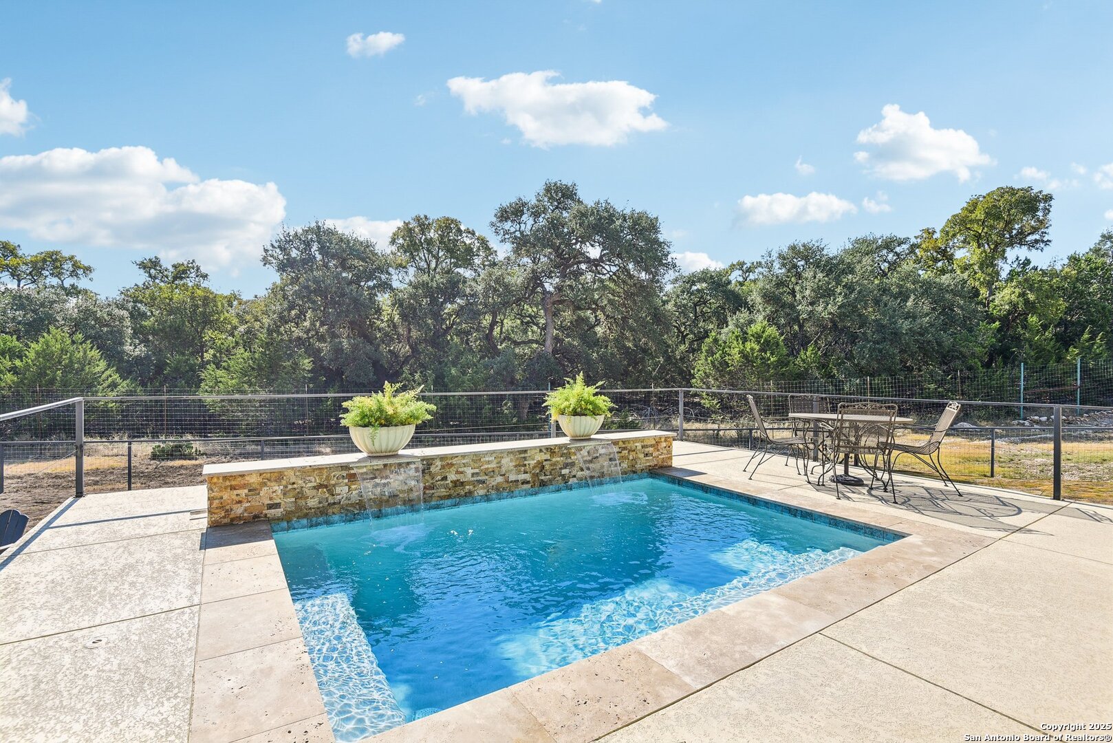 449 Hanging Oak Spring Branch, TX 78070 - Photo 43 of 49 a view of a swimming pool with a lounge chair