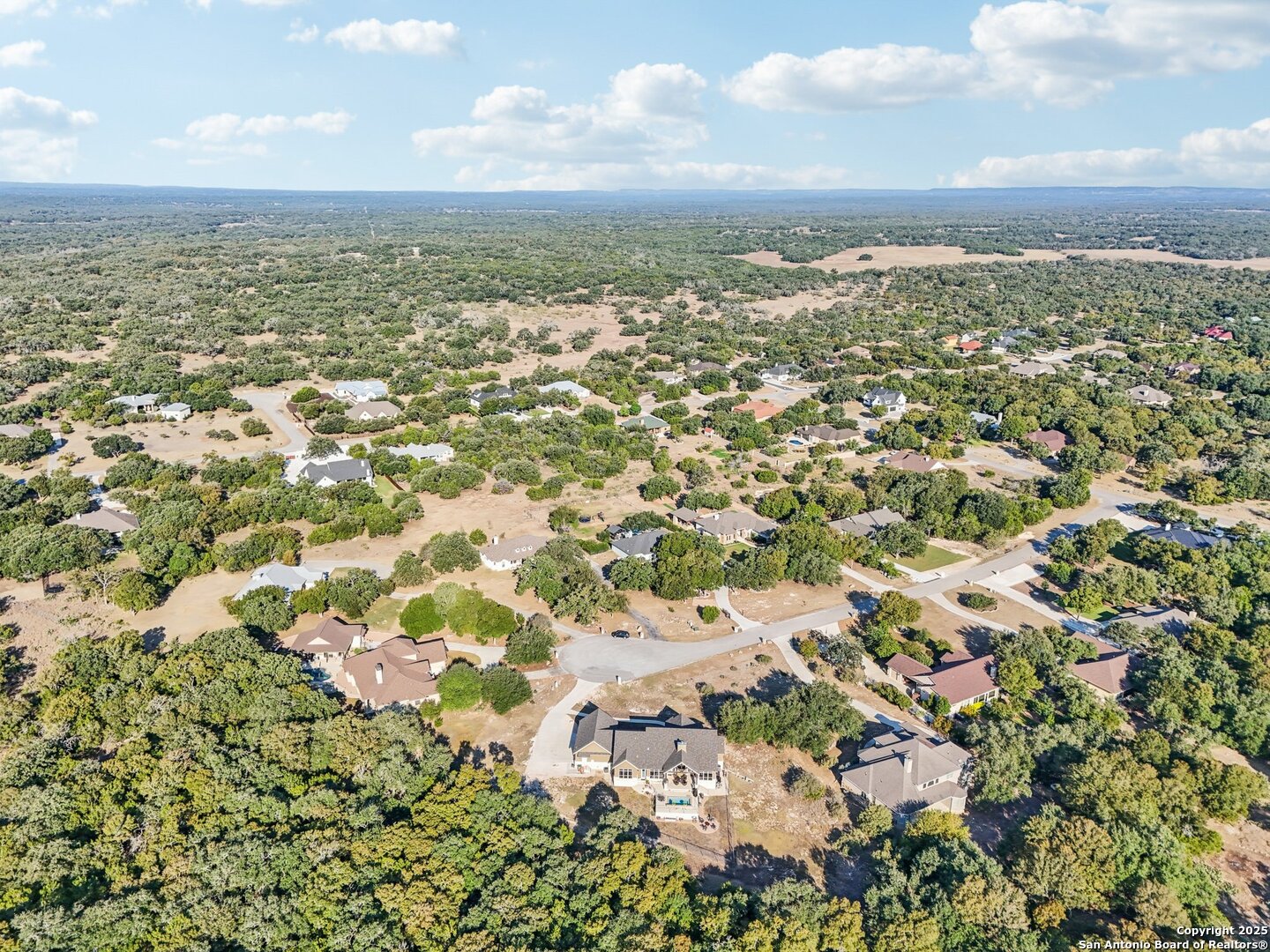 449 Hanging Oak Spring Branch, TX 78070 - Photo 49 of 49 view of city and mountain