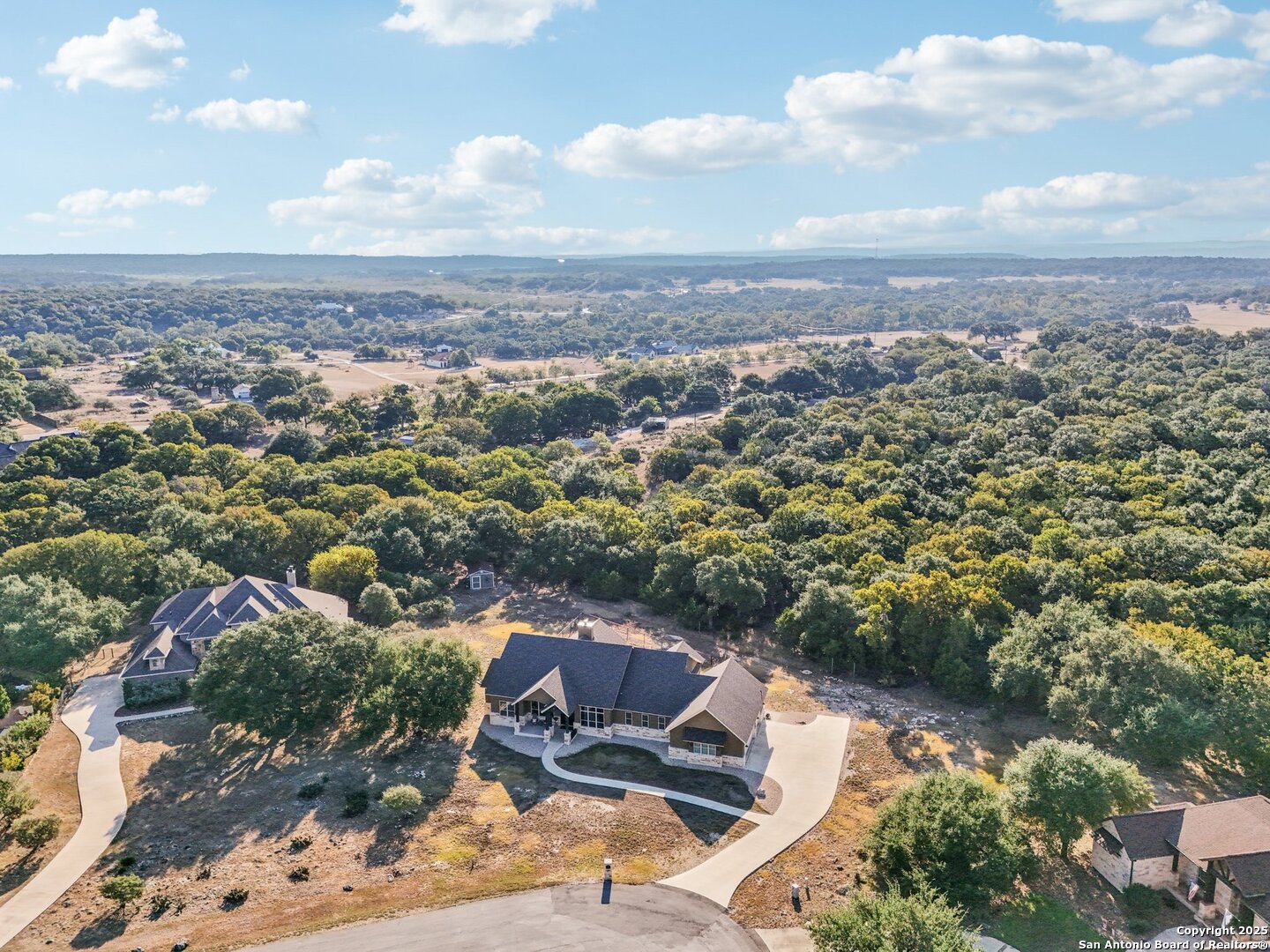 449 Hanging Oak Spring Branch, TX 78070 - Photo 5 of 49 an aerial view of a house with a yard