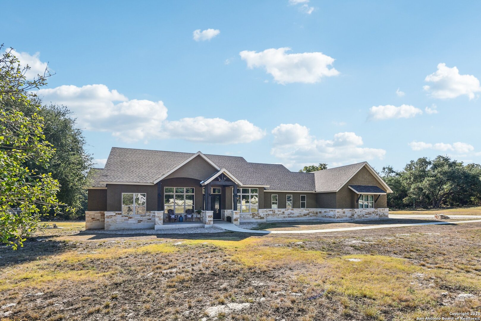 449 Hanging Oak Spring Branch, TX 78070 - Photo 6 of 49 a view of a house with swimming pool and a yard