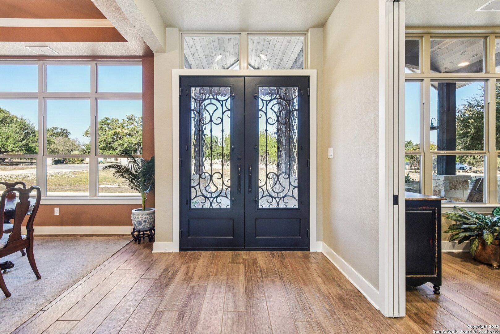 449 Hanging Oak Spring Branch, TX 78070 - Photo 7 of 49 an empty room with wooden floor and windows