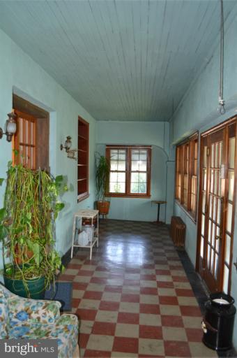 4408 Ridge Road Baltimore, MD 21236 - Photo 6 of 11 Enclosed Front Porch