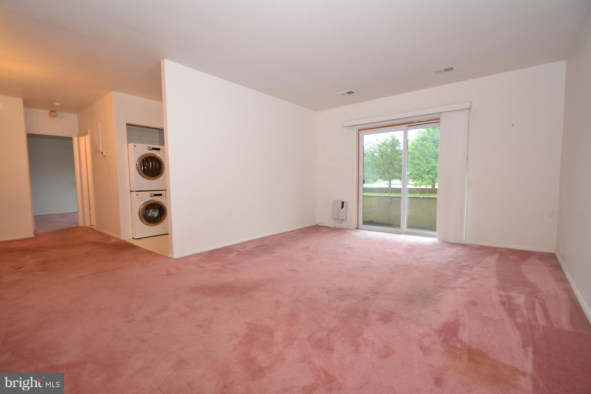 3922 Rolling Rd., Unit A5 Baltimore, MD 21208 - Photo 3 of 8 a view of a livingroom with a workspace