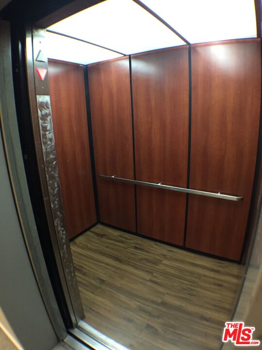 428 South Grand View Street Los Angeles, CA 90057 - Photo 25 of 29 an empty room with wooden floor and entrance