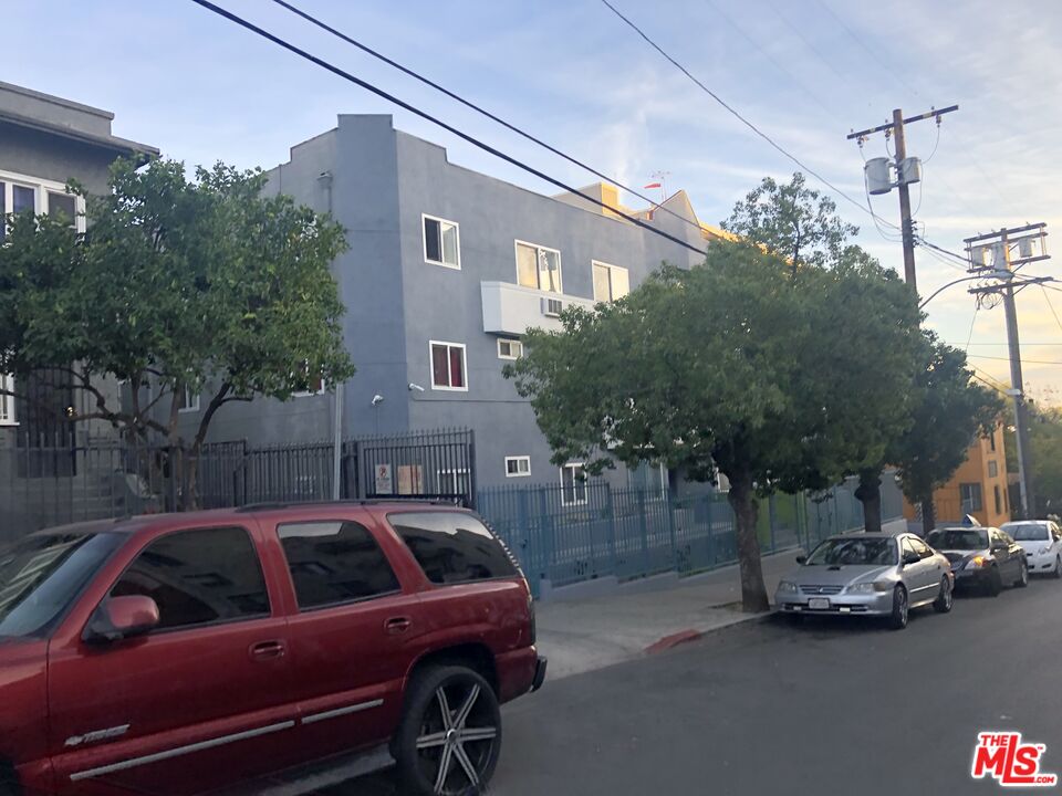 428 South Grand View Street Los Angeles, CA 90057 - Photo 26 of 29 a view of a cars park in front of a house